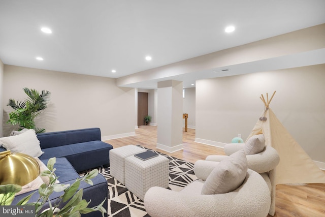 12300 La Plata St, Silver Spring, MD 20904 - living area with light wood finished floors, recessed lighting, and baseboards