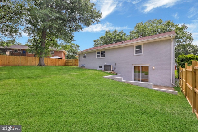12300 La Plata St, Silver Spring, MD 20904 - rear view of house with central air condition unit and brick siding