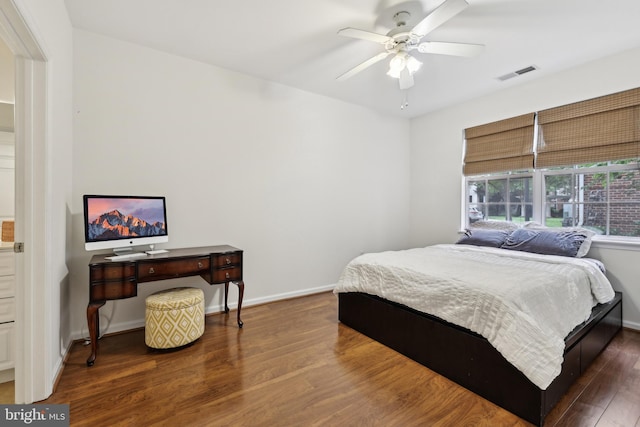 12925 Centre Park Cir Unit 106, Herndon, VA 20171 - bedroom featuring wood finished floors, baseboards, and ceiling fan