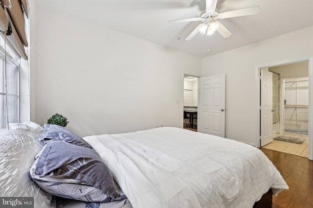 12925 Centre Park Cir Unit 106, Herndon, VA 20171 - bedroom featuring wood finished floors, ensuite bathroom, and ceiling fan
