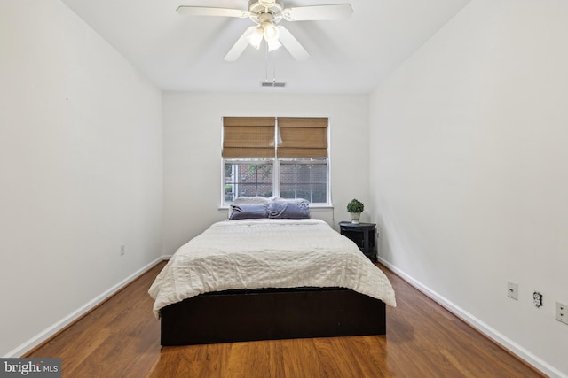 12925 Centre Park Cir Unit 106, Herndon, VA 20171 - bedroom featuring wood finished floors, baseboards, and ceiling fan