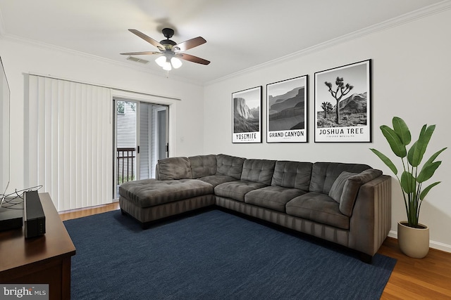 12925 Centre Park Cir Unit 106, Herndon, VA 20171 - living area featuring wood finished floors, ornamental molding, ceiling fan, and baseboards