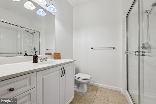 12925 Centre Park Cir Unit 106, Herndon, VA 20171 - full bath with a shower stall, toilet, tile patterned flooring, vanity, and baseboards