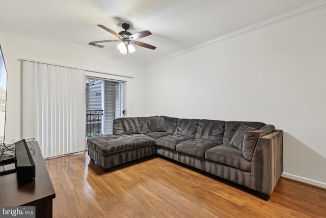 12925 Centre Park Cir Unit 106, Herndon, VA 20171 - living area featuring wood finished floors, ceiling fan, crown molding, and healthy amount of natural light