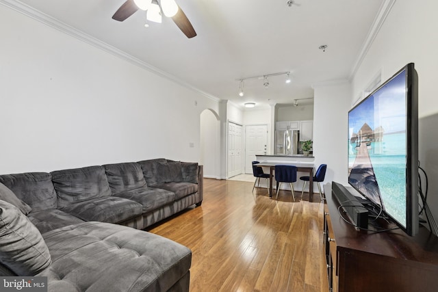 12925 Centre Park Cir Unit 106, Herndon, VA 20171 - living room with arched walkways, light wood-style floors, a ceiling fan, ornamental molding, and track lighting