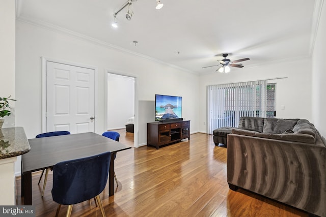 12925 Centre Park Cir Unit 106, Herndon, VA 20171 - living room featuring ceiling fan, wood finished floors, and crown molding
