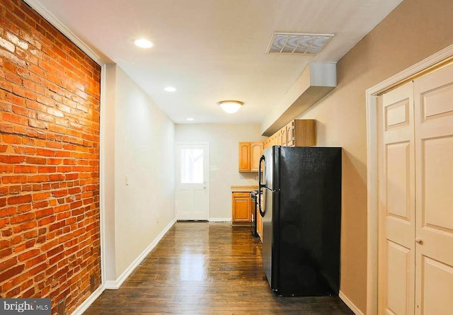 1114 W Cross St, Baltimore, MD 21230 - kitchen featuring freestanding refrigerator, brick wall, dark wood-style flooring, light countertops, and recessed lighting