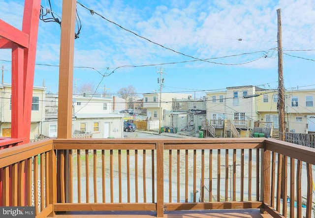 1114 W Cross St, Baltimore, MD 21230 - wooden deck with a residential view