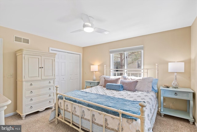 917 Lake View Dr, Bethany Beach, DE 19930 - bedroom with light carpet, a closet, and a ceiling fan