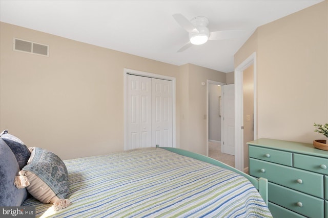 917 Lake View Dr, Bethany Beach, DE 19930 - bedroom featuring a closet, ceiling fan, light carpet, and baseboards