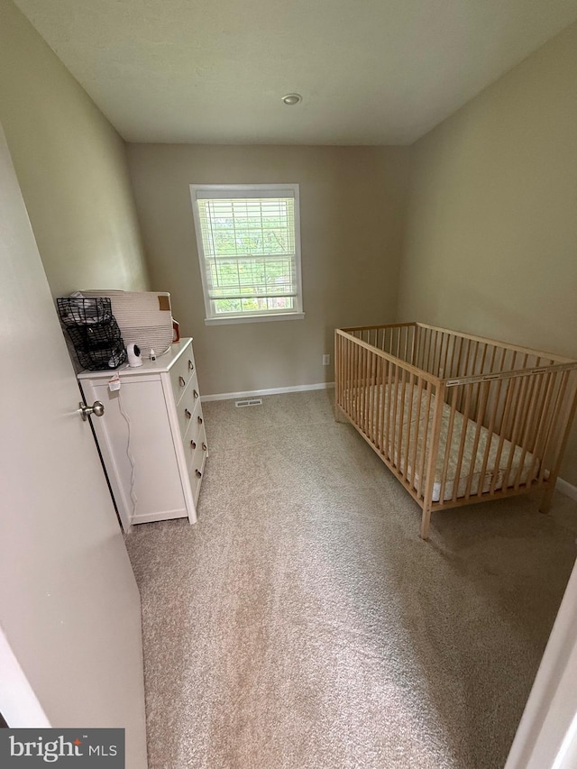 6802 Grays Mill Rd, Warrenton, VA 20187 - unfurnished bedroom featuring baseboards, light carpet, and a crib
