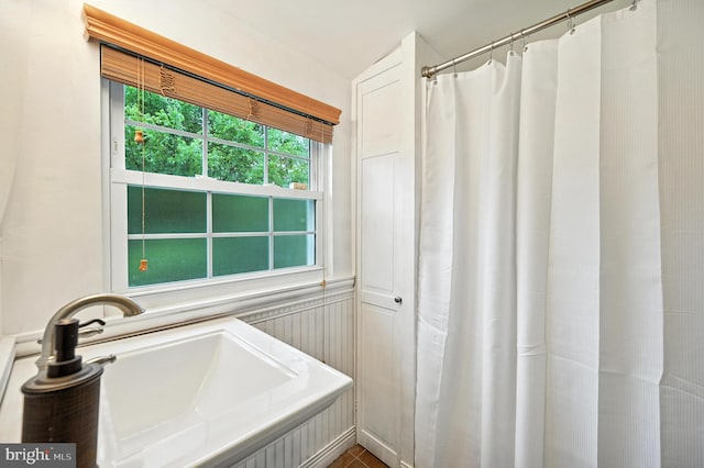 3921 22nd St NE, Washington, DC 20018 - bathroom with a sink and curtained shower