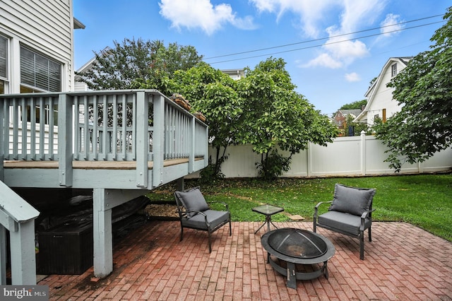 3921 22nd St NE, Washington, DC 20018 - fenced backyard featuring an outdoor fire pit, a patio, and a deck