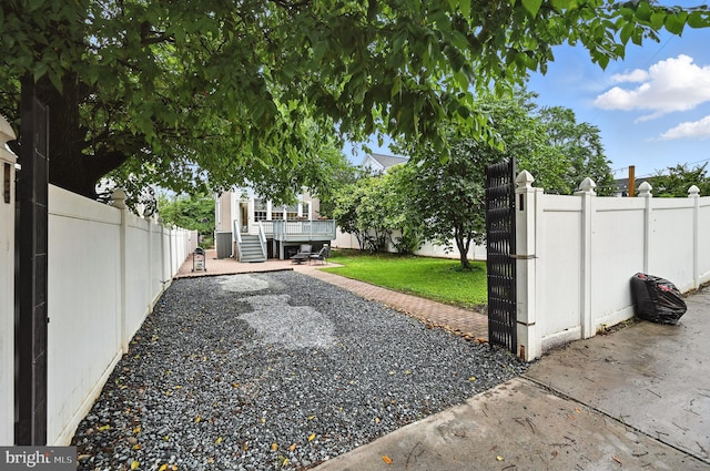 3921 22nd St NE, Washington, DC 20018 - fenced yard with a gate and a wooden deck
