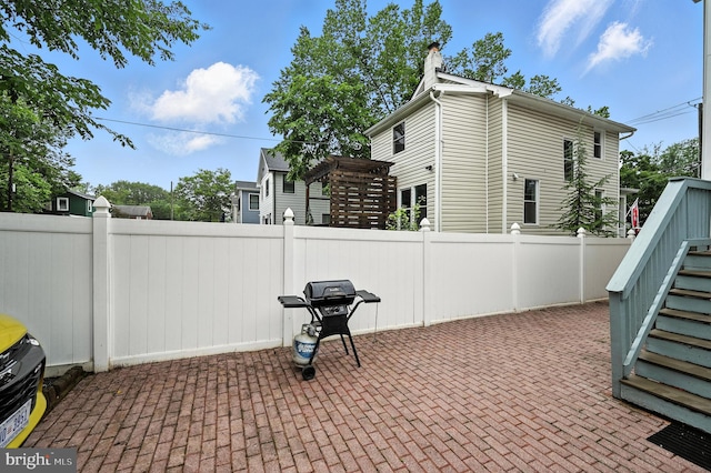 3921 22nd St NE, Washington, DC 20018 - view of patio / terrace featuring grilling area, a pergola, and stairway