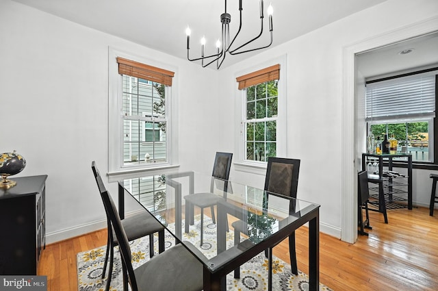 3921 22nd St NE, Washington, DC 20018 - dining space with a chandelier and hardwood / wood-style flooring