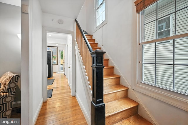 3921 22nd St NE, Washington, DC 20018 - stairs featuring baseboards and wood finished floors