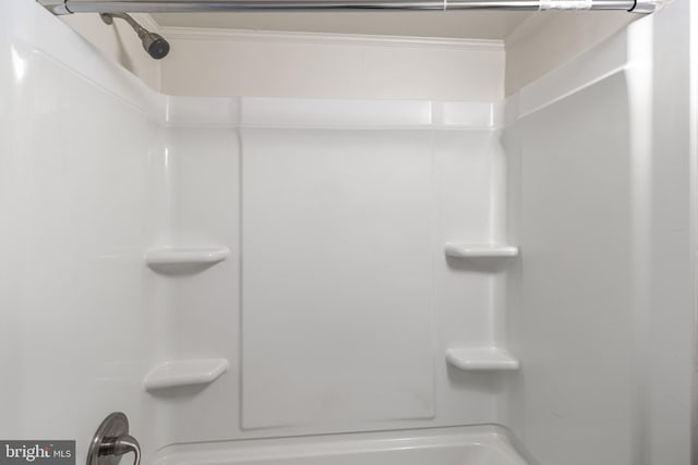 3811 Swann Rd Unit T-3, Suitland, MD 20746 - bathroom with shower / tub combination and crown molding