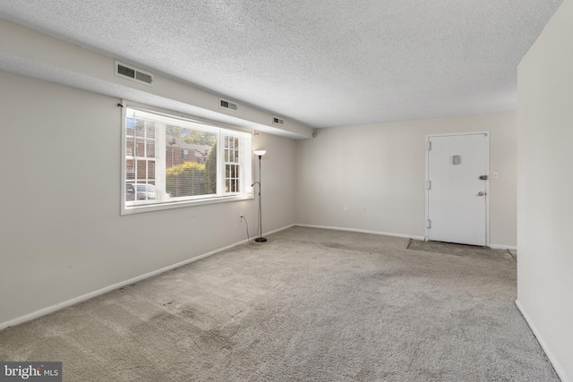 3811 Swann Rd Unit T-3, Suitland, MD 20746 - unfurnished room with carpet floors, a textured ceiling, and baseboards