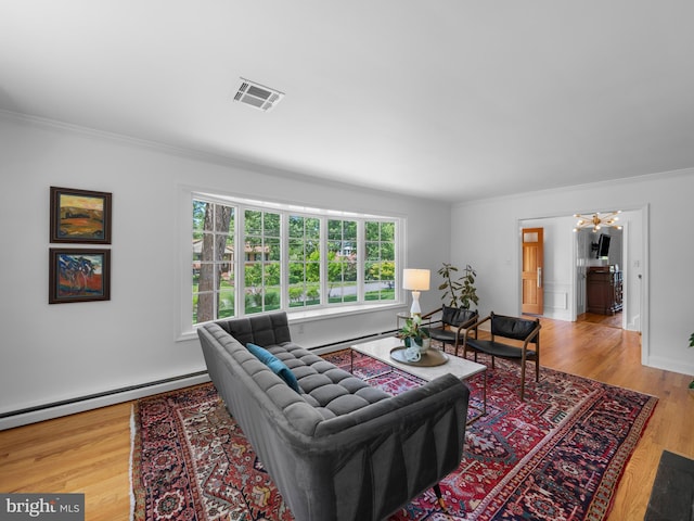 9103 Chickawane Ct, Alexandria, VA 22309 - living room with a chandelier, ornamental molding, baseboard heating, and wood finished floors