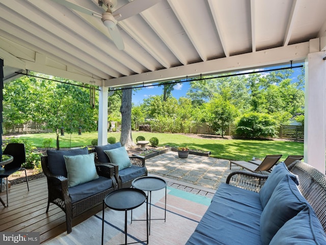 9103 Chickawane Ct, Alexandria, VA 22309 - view of patio with a ceiling fan, view of wooded area, and an outdoor living space