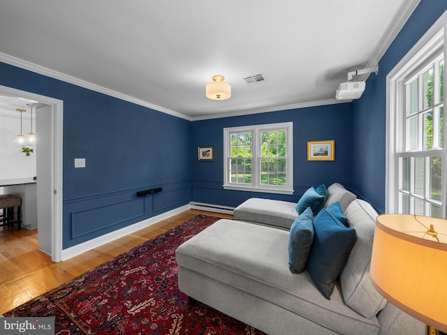 9103 Chickawane Ct, Alexandria, VA 22309 - sitting room featuring wood finished floors, ornamental molding, and wainscoting