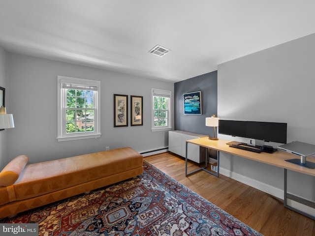 9103 Chickawane Ct, Alexandria, VA 22309 - office area with baseboard heating and wood finished floors