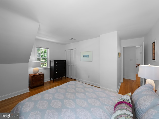 9103 Chickawane Ct, Alexandria, VA 22309 - bedroom with wood finished floors, baseboards, and a closet