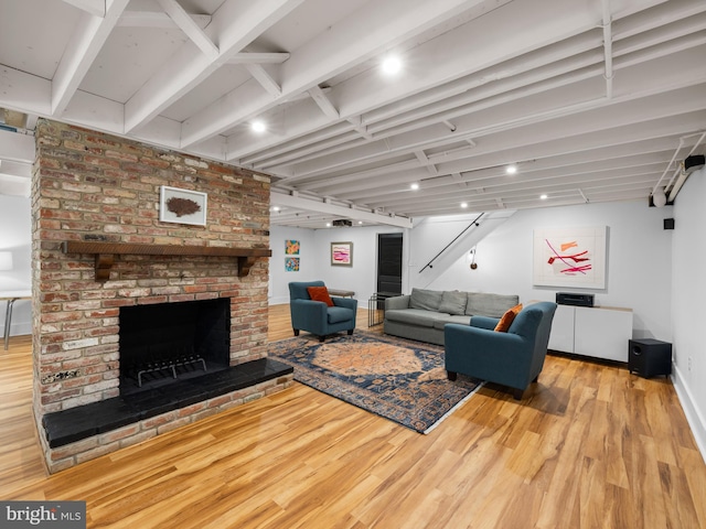 9103 Chickawane Ct, Alexandria, VA 22309 - living area with wood finished floors, stairway, a fireplace, and baseboards