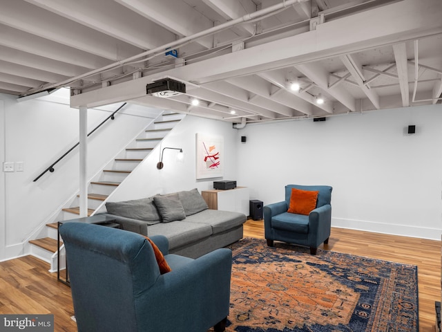 9103 Chickawane Ct, Alexandria, VA 22309 - living room featuring wood finished floors, stairs, and baseboards