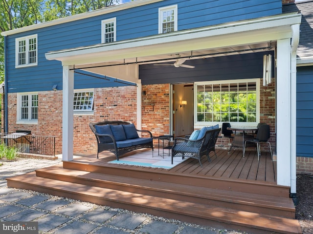 9103 Chickawane Ct, Alexandria, VA 22309 - wooden deck with an outdoor living space