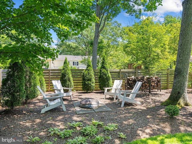 9103 Chickawane Ct, Alexandria, VA 22309 - view of yard featuring a fire pit