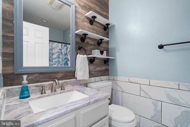1971 High Top Rd, Linden, VA 22642 - full bath featuring vanity, tile walls, and wainscoting