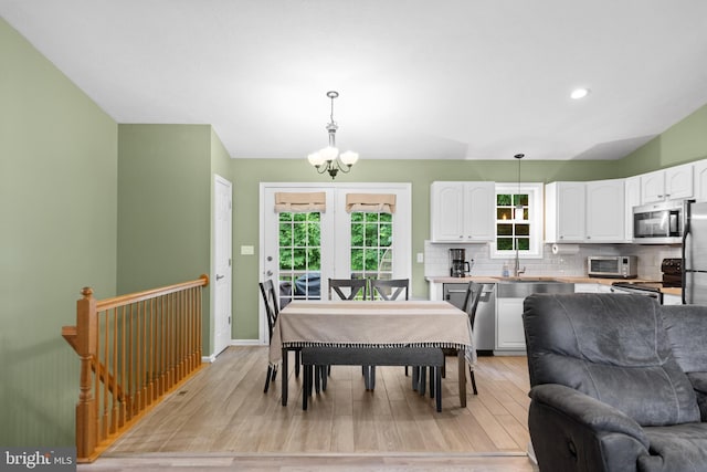1971 High Top Rd, Linden, VA 22642 - dining area featuring a chandelier, light wood-style floors, french doors, and recessed lighting