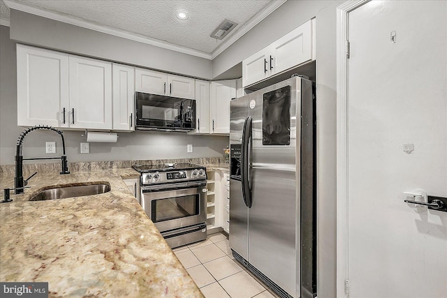 425 Robin Dr Unit 302, Ocean City, MD 21842 - kitchen featuring appliances with stainless steel finishes, a sink, ornamental molding, white cabinets, and light tile patterned flooring