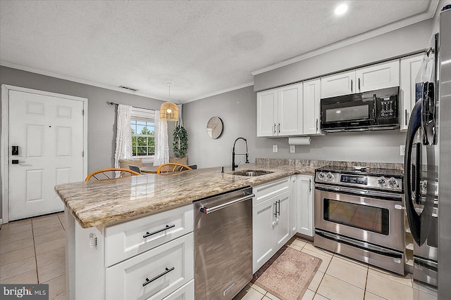 425 Robin Dr Unit 302, Ocean City, MD 21842 - kitchen with appliances with stainless steel finishes, a sink, a peninsula, light tile patterned flooring, and ornamental molding