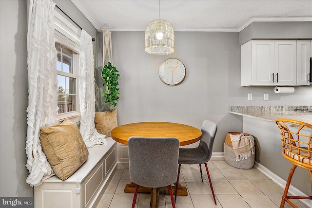 425 Robin Dr Unit 302, Ocean City, MD 21842 - dining room with crown molding, light tile patterned flooring, and baseboards