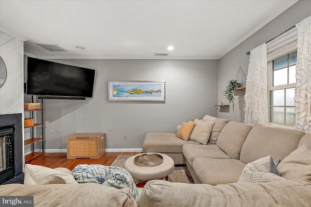 425 Robin Dr Unit 302, Ocean City, MD 21842 - living room featuring crown molding, wood finished floors, baseboards, a fireplace, and recessed lighting
