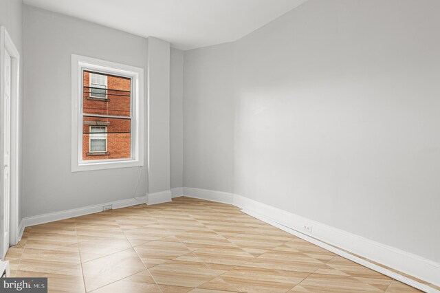755 S 22nd St, Philadelphia, PA 19146 - unfurnished room with light tile patterned floors and baseboards