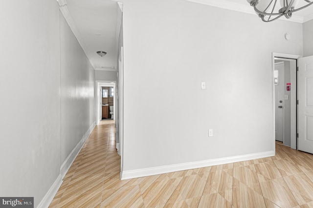755 S 22nd St, Philadelphia, PA 19146 - corridor featuring crown molding, a chandelier, and baseboards