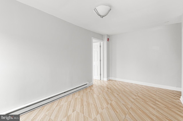 755 S 22nd St, Philadelphia, PA 19146 - empty room with a baseboard radiator and baseboards