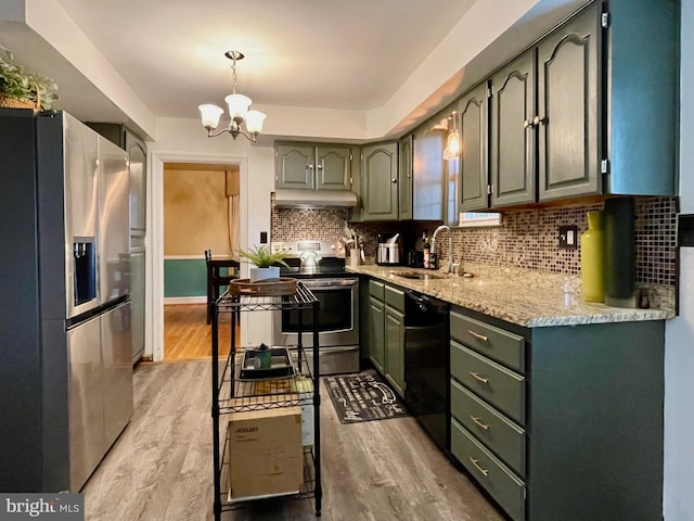 1506 Mcgovern Ter, Wilmington, DE 19805 - kitchen with stainless steel appliances, a sink, ventilation hood, light wood-style flooring, and backsplash