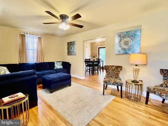 1506 Mcgovern Ter, Wilmington, DE 19805 - living area featuring light wood-type flooring, a ceiling fan, and baseboards