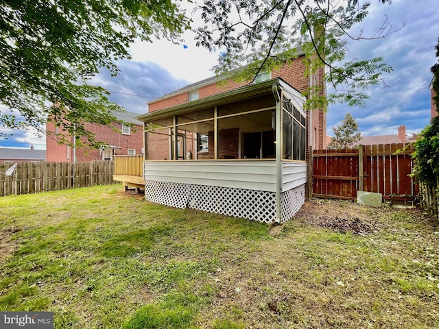 1506 Mcgovern Ter, Wilmington, DE 19805 - rear view of house with a sunroom