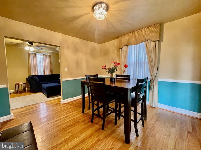 1506 Mcgovern Ter, Wilmington, DE 19805 - dining space with wood finished floors, baseboards, ceiling fan, and a chandelier