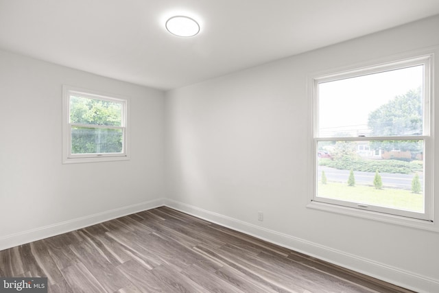 1164 Fairfax Pike, White Post, VA 22663 - unfurnished room featuring dark wood-style floors and baseboards