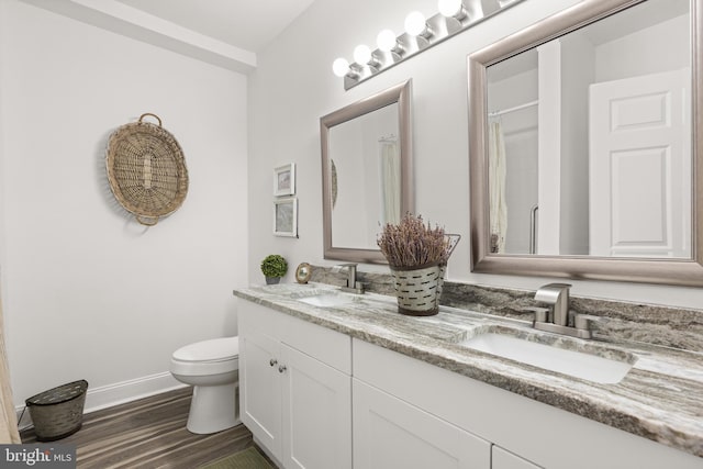 1164 Fairfax Pike, White Post, VA 22663 - full bath with double vanity, wood finished floors, toilet, baseboards, and a shower with curtain