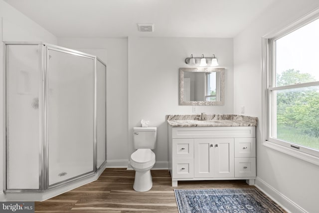 1164 Fairfax Pike, White Post, VA 22663 - bathroom featuring vanity, a shower stall, wood finished floors, toilet, and baseboards