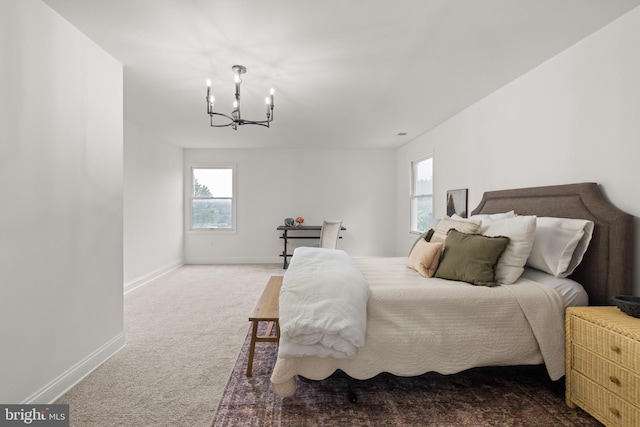 1164 Fairfax Pike, White Post, VA 22663 - carpeted bedroom featuring a chandelier and baseboards
