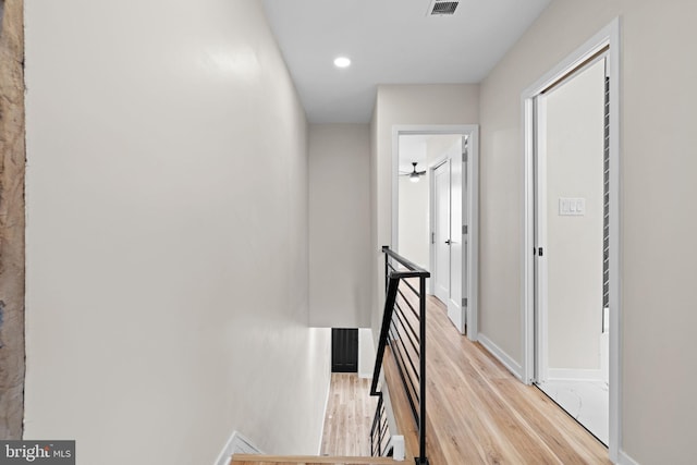 1728 S Bancroft St, Philadelphia, PA 19145 - hall featuring an upstairs landing, light wood-style flooring, baseboards, and recessed lighting